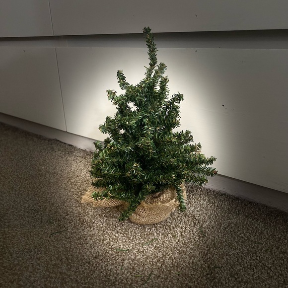 Artificial christmas tree- small at 13 inches with brown wrapping on bottom. - Picture 1 of 3